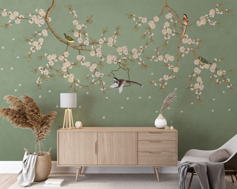 Fototapet i eleganta gröna nyanser med asiatiskt motiv Birds in Cherry Blossoms - huvudproduktbild