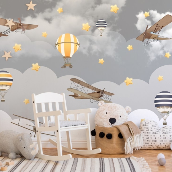 Fototapet Ballonger och flygplan i molnen