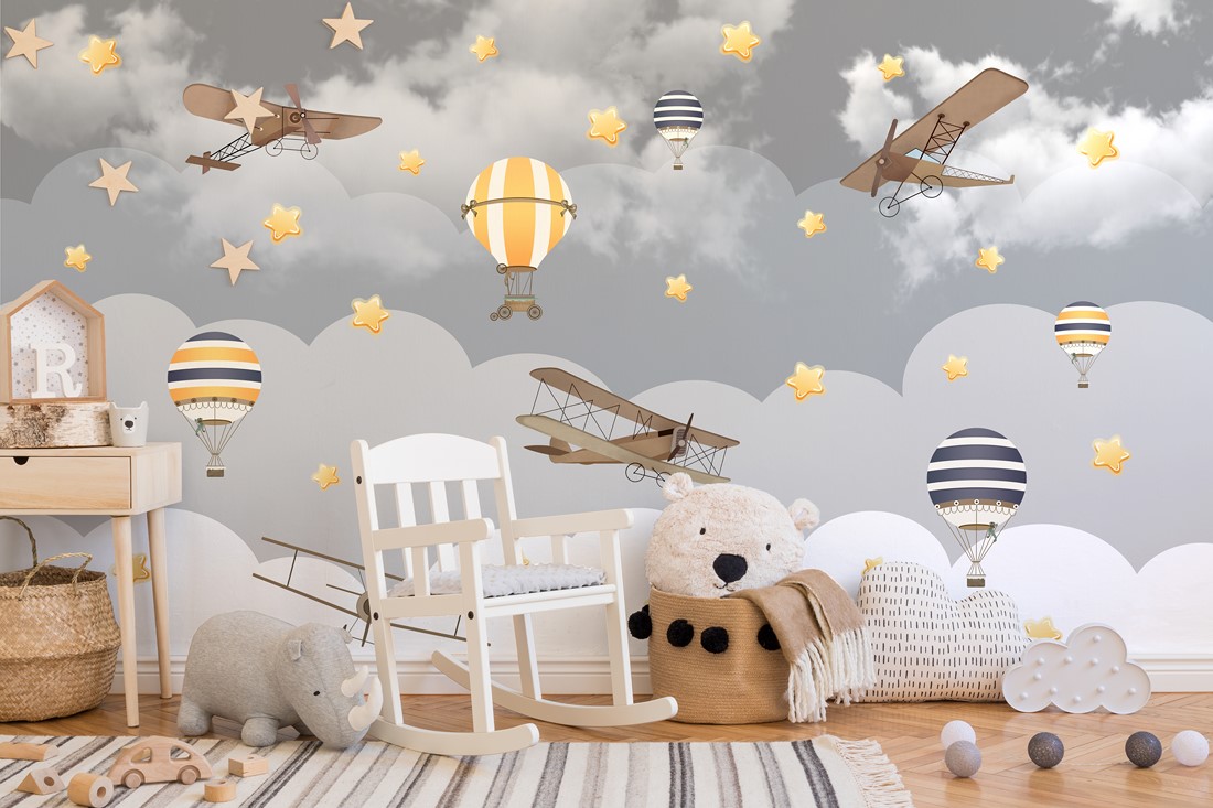 Fototapet Ballonger och flygplan i molnen