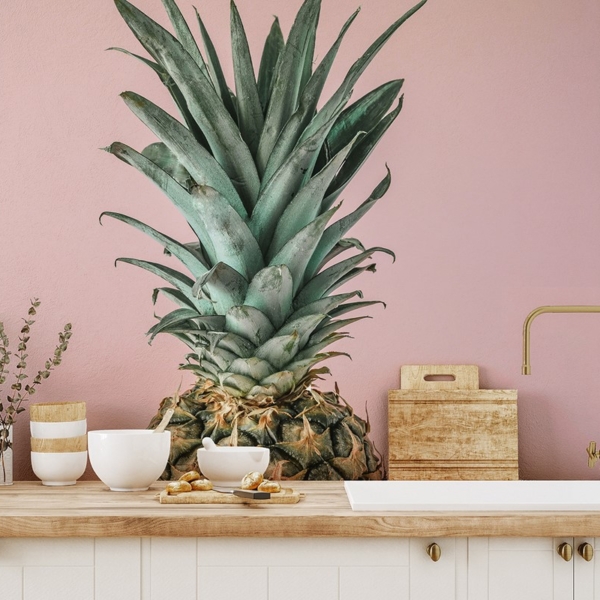 Fototapet Ananas på en rosa bakgrund